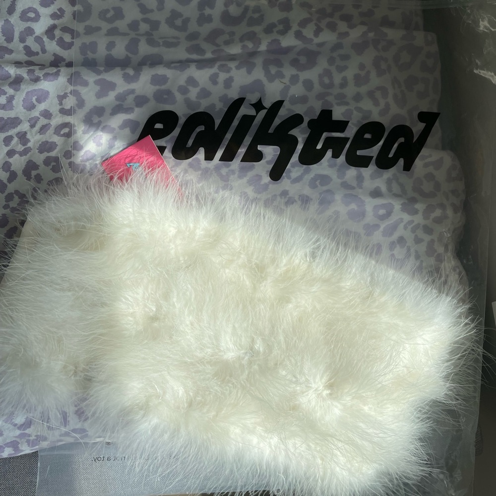 This is a beautiful faux fur top from a popular brand on TikTok named Edikted.